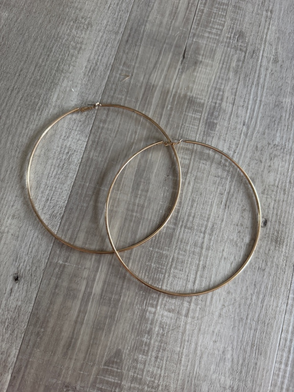 Large gold hoop earrings